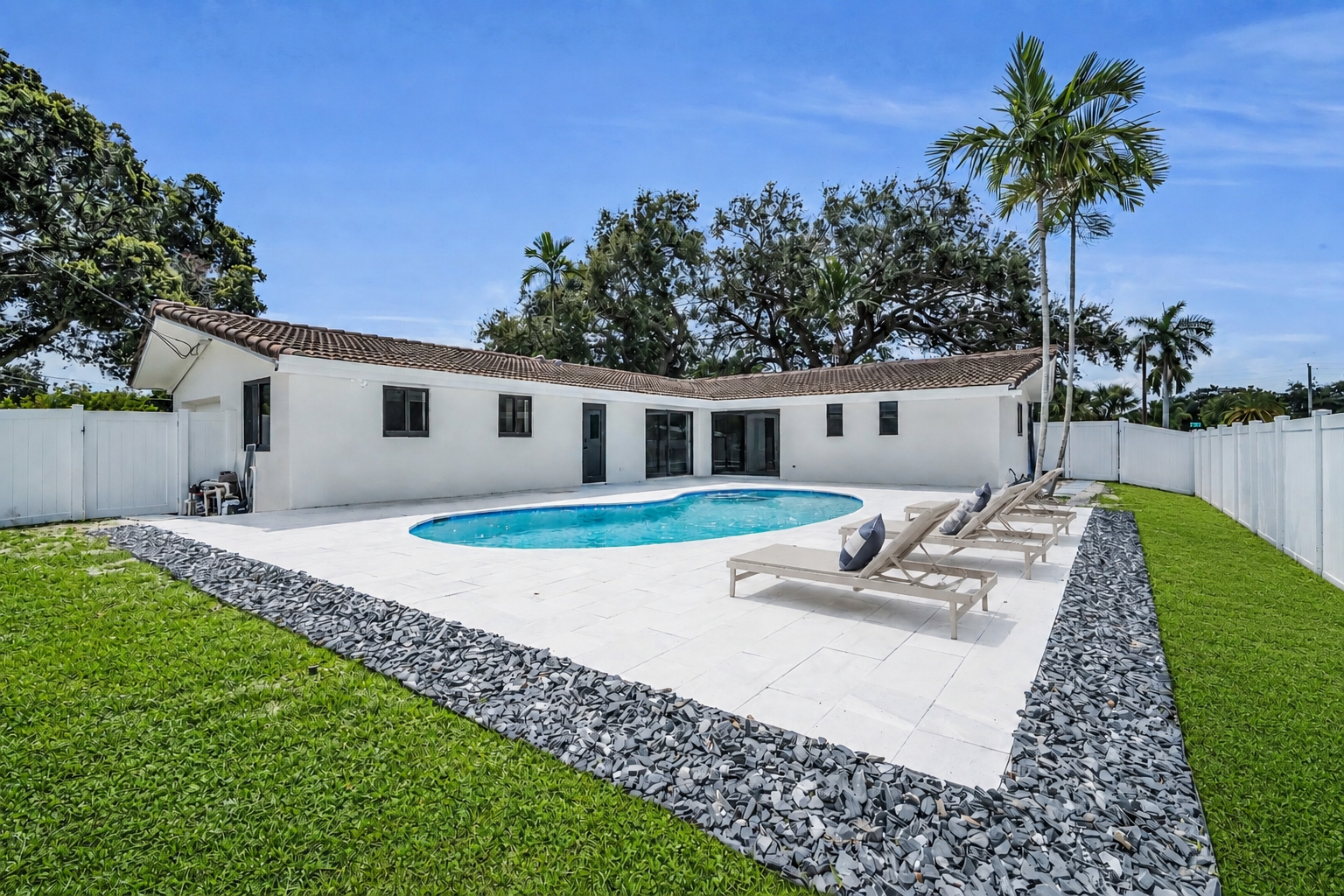The Ivory private pool and backyard